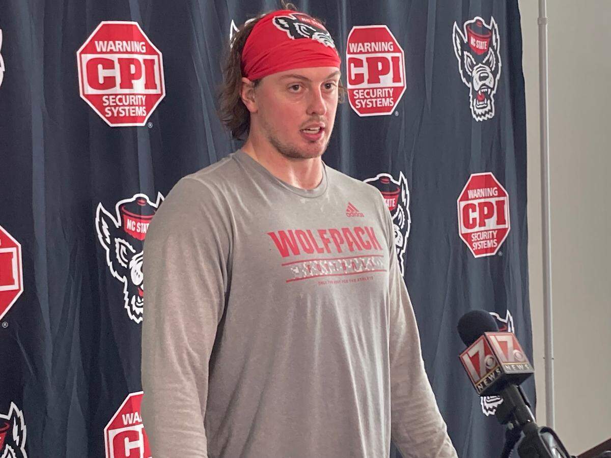 NC State defensive end Noah Potter, a transfer from Cincinnati, answers media questions after spring football practice March 7, 2023.