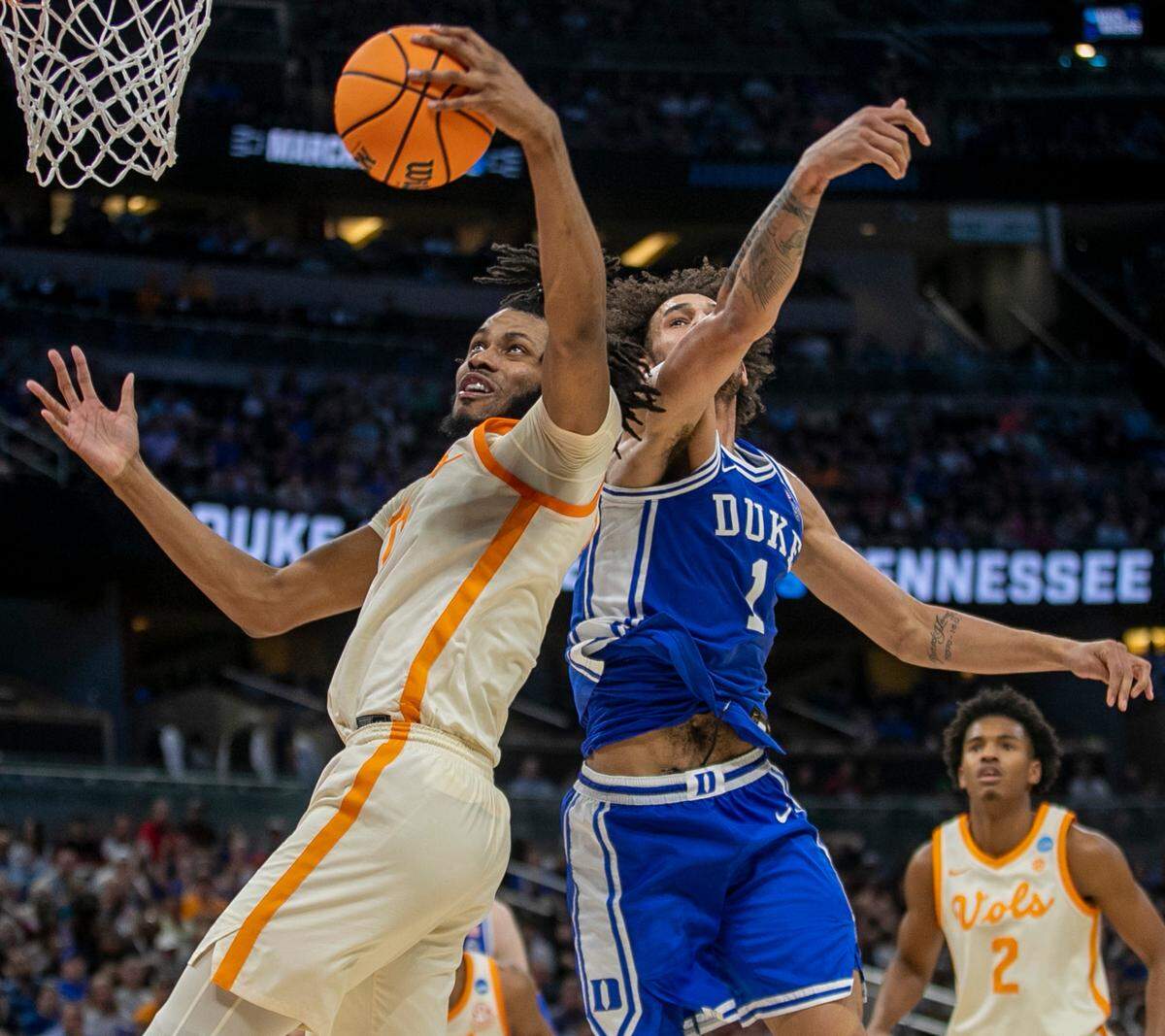Tennessee’s Jonas Aidoo (0) secures a defensive rebound over Duke’s Dereck Lively II (1) during the first half in the second round of the NCAA Tournament on Saturday, March 18, 2023 at the Amway Center in Orlando, Fla.