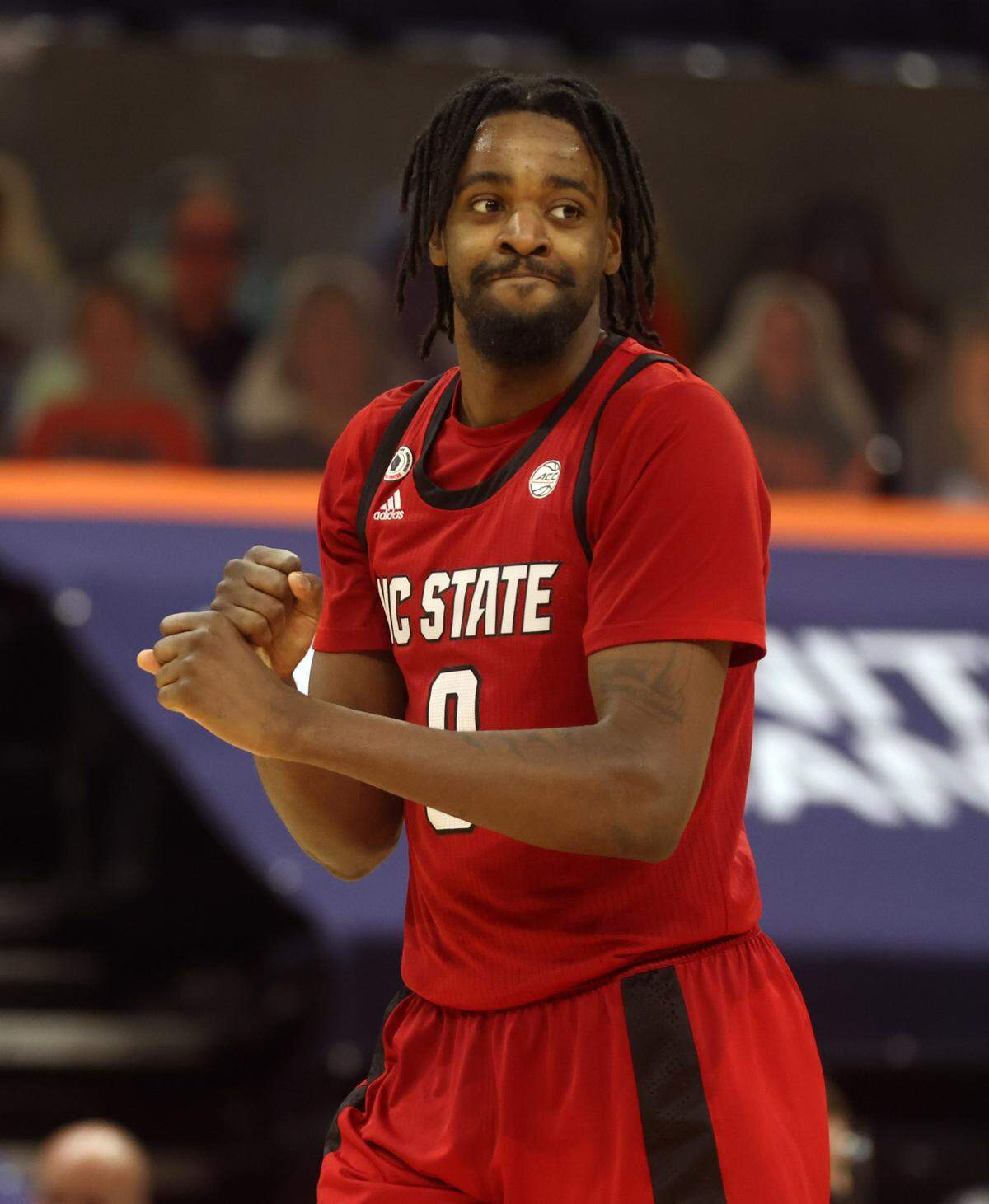 North Carolina State forward DJ Funderburk (0) smiles after being fouled during the game Wednesday in Charlottesville, Va. North Carolina State defeated Virginia 68-61.