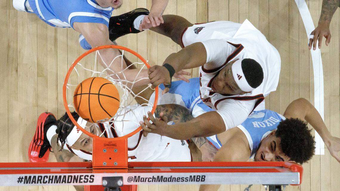 The most memorable photos from the UNC-NC State rivalry game, an instant classic