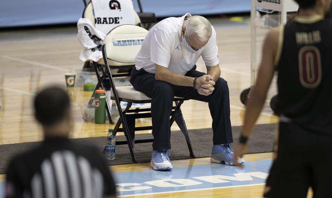 North Carolina coach Roy Williams hangs his head after a foul was called on Garrison Brooks in second half against College of Charleston on Wednesday, November 25, 2020 at the Smith Center in Chapel Hill, N.C.