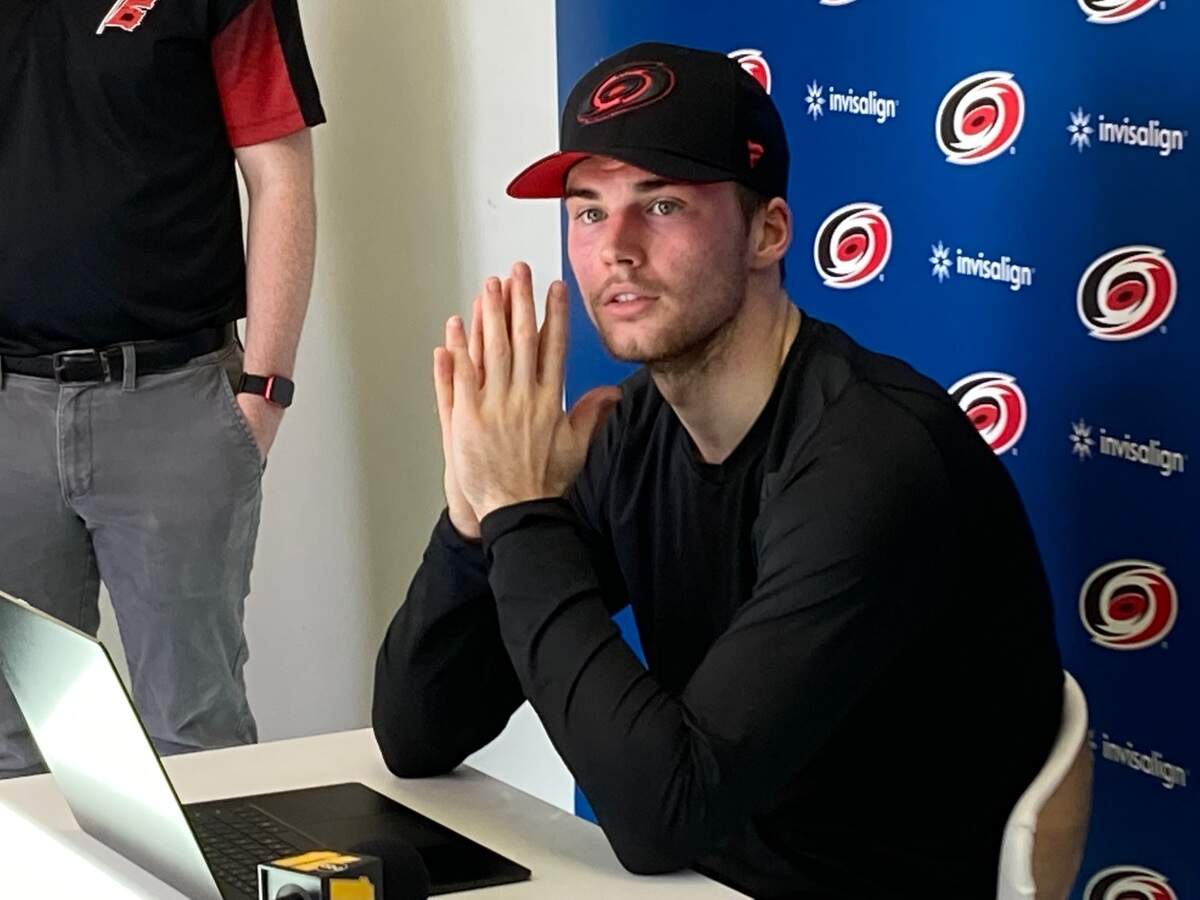 Goaltender Jack LaFontaine, who left the University of Minnesota to sign an entry level contract with the Carolina Hurricanes, answers media questions after his first team practice Wednesday..