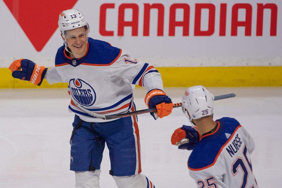Feb 11, 2023; Ottawa, Ontario, CAN; Edmonton Oilers right wing Jesse Puljujarvi (13) celebrates his goal scored against the Ottawa Senators in the third period at the Canadian Tire Centre. Mandatory Credit: Marc DesRosiers-USA TODAY Sports
