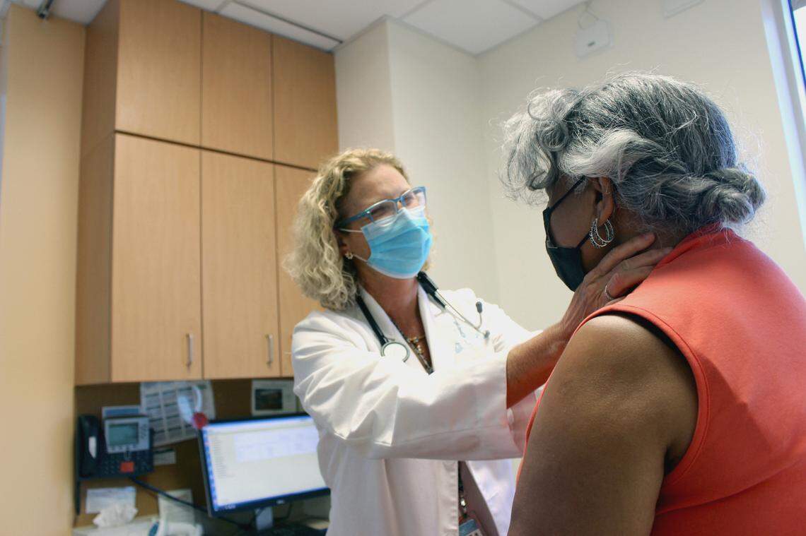 Medical oncologist and UNC-CH cancer researcher Dr. Lisa A. Carey examines a breast cancer patient at the North Carolina Cancer Hospital.