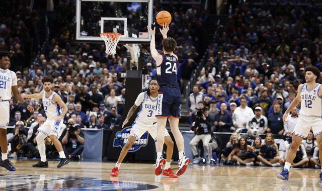 UConn’s Braylon Mullins (24) takes what will be the winning three-pointer in the final second of UConn’s 73-72 victory over Duke in the NCAA Men’s Tournament East Regional Final at Capital One Arena in Washington, D.C., Sunday, March 29, 2026.