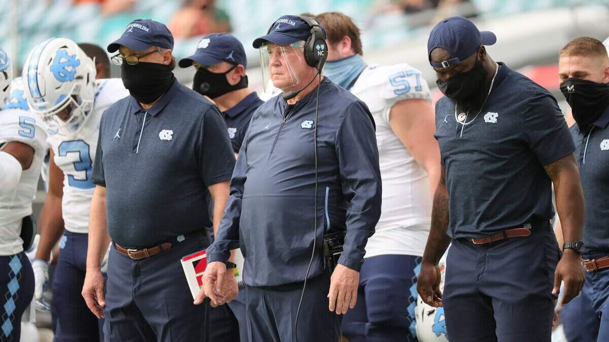 North Carolina Tar Heels coach Mack Brown on the sideline as they play the Miami Hurricanes at Hard Rock Stadium In Miami Gardens, Florida, Saturday, December 12, 2020.