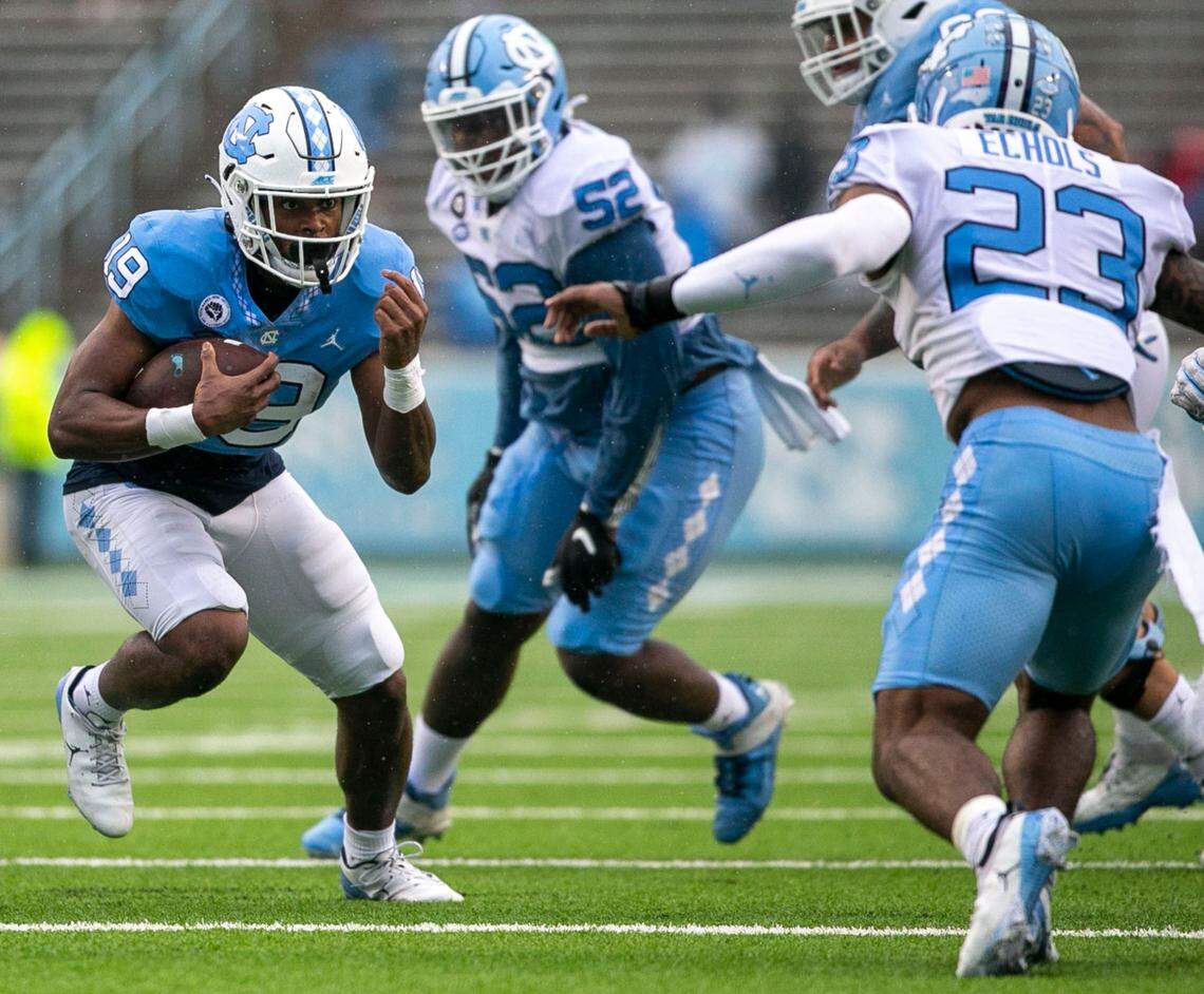 North Carolina running back Ty Chandler (19) carries the ball during the Tar Heels’ Spring football game on Saturday, April 24, 2021 in Chapel Hill, N.C.