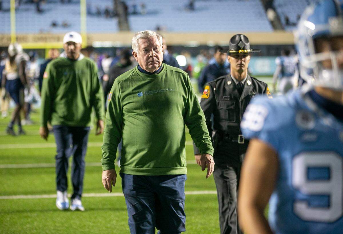 North Carolina coach Mack Brown leaves the field following the Tar Heels’ 21-17 loss to Georgia Tech on Saturday, November 19, 2022 at Kenan Stadium in Chapel Hill, N.C.