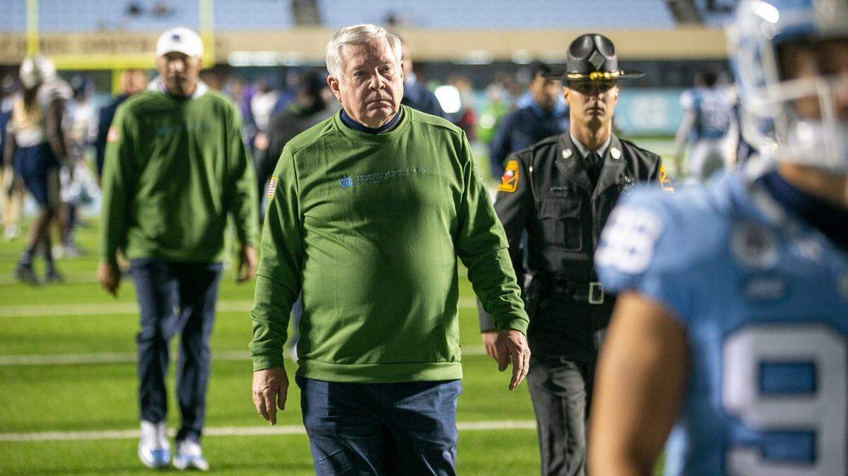 North Carolina coach Mack Brown leaves the field following the Tar Heels’ 21-17 loss to Georgia Tech on Saturday, November 19, 2022 at Kenan Stadium in Chapel Hill, N.C.