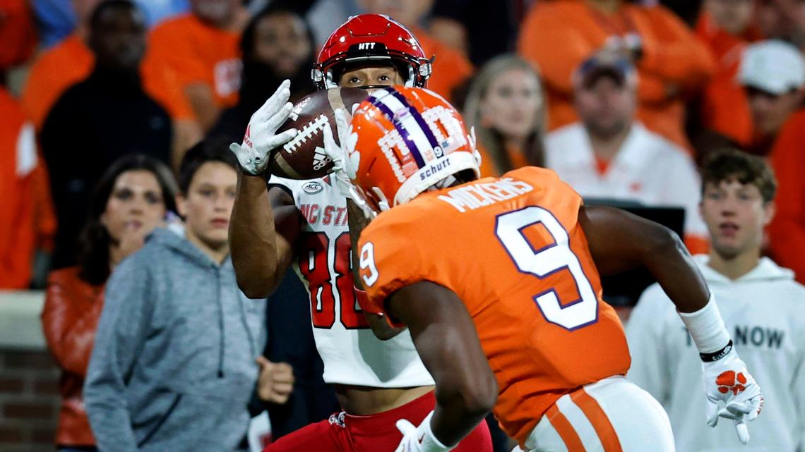 N.C. State wide receiver Devin Carter (88) pulls in a reception as Clemson safety R.J. Mickens (9) defends during the first half of N.C. State’s game against Clemson at Memorial Stadium in Clemson, S.C., Saturday, Oct. 1, 2022.