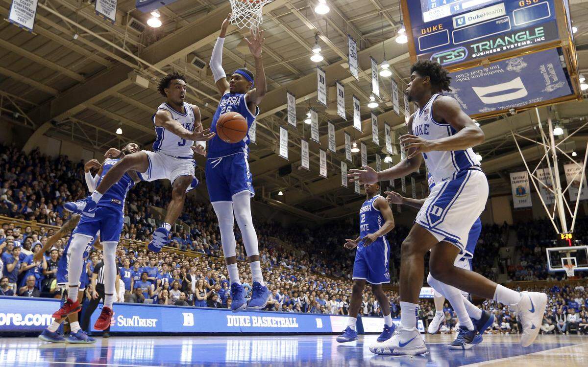 Duke’s Tre Jones (3) passes to Vernon Carey Jr. (1) during Duke’s 74-63 victory over Georgia State at Cameron Indoor Stadium in Durham, N.C., Friday, Nov. 15, 2019.