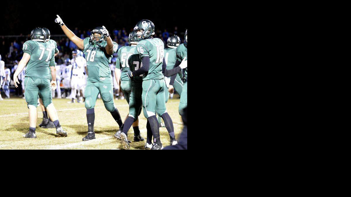 Green Hope’s Keanu Gonzales (78) celebrates the win. The Panther Creek Catamounts and the Green Hope Falcons played for the Southwest Wake Athletic Conference title in the last regular season football game in Cary on Friday, November 7, 2014. Green Hope won 17-10.
