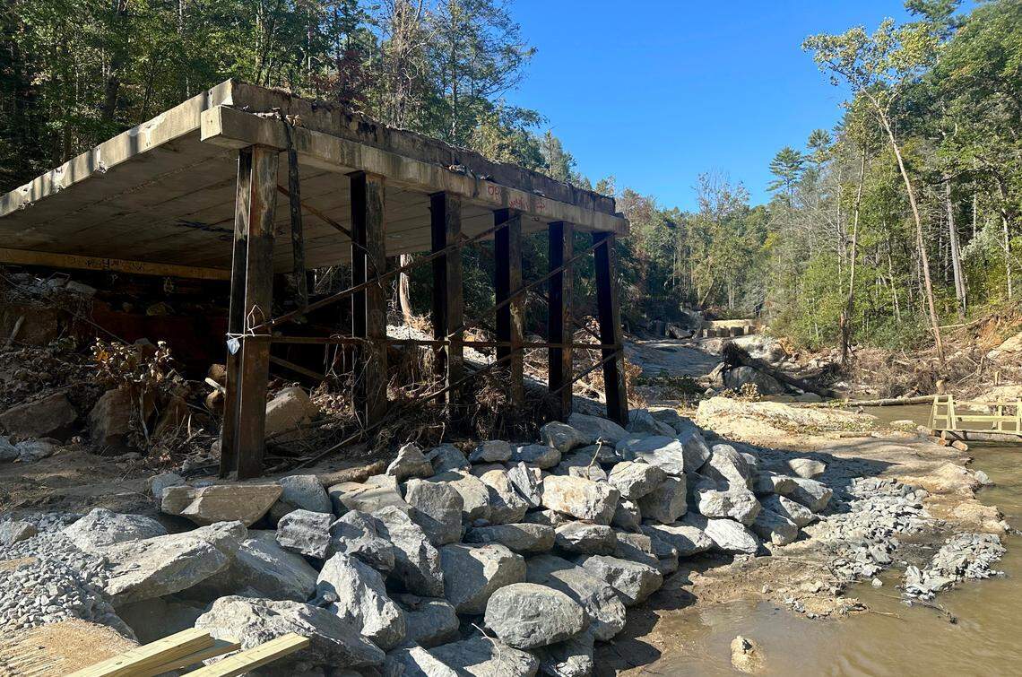 What’s left of the Big Hungry Road bridge over the Hungry River in Henderson County, N.C. Dozens of people live in an area cut off to traffic since the remnants of Hurricane Helene took out the bridge.