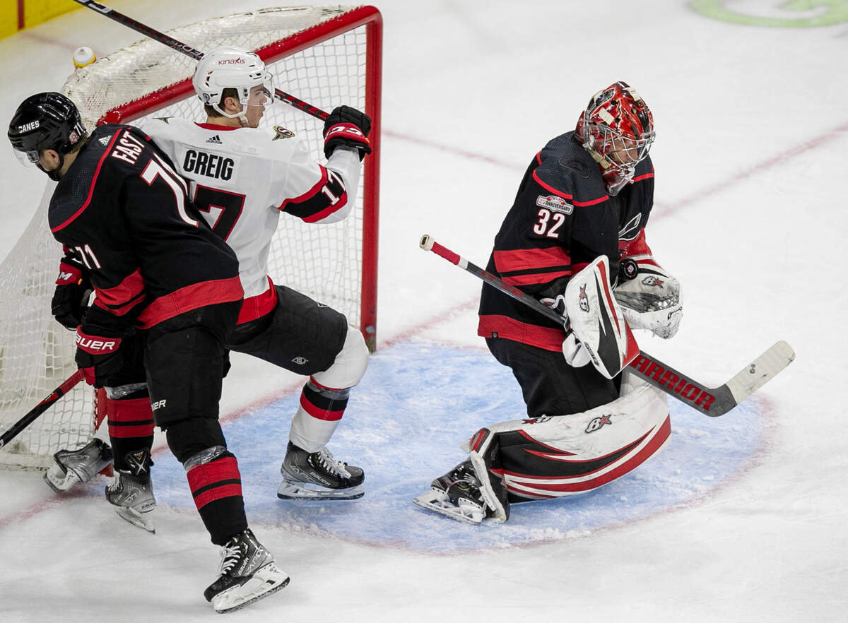 Carolina Hurricanes’ goalie Antii Raanta (32) stops a scoring attempt by Ottawa during the second period on Tuesday, April 4, 2023 at PNC Arena in Raleigh, N.C.