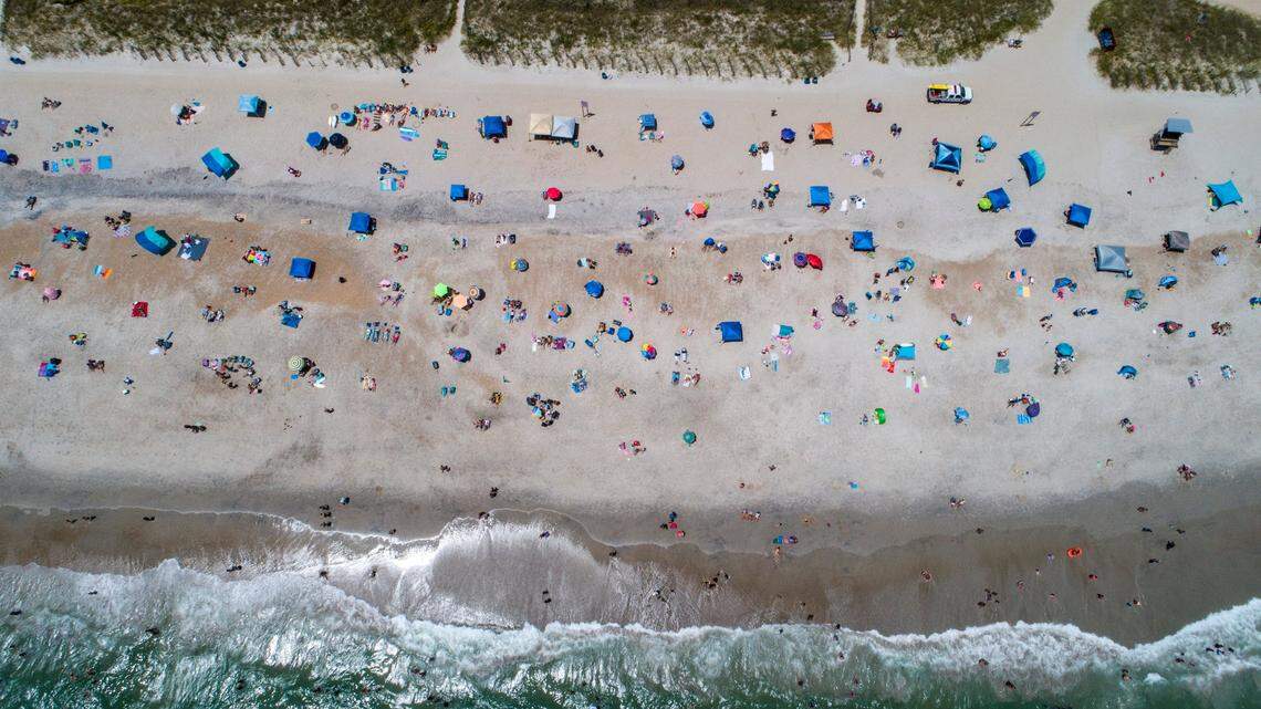 Beachgoers pack Wrightsville Beach in August 2020.