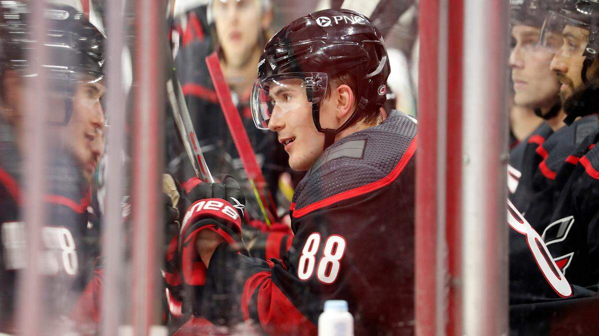 Carolina Hurricanes’ Martin Necas (88) watches play during the second period of an NHL hockey game against the Dallas Stars in Raleigh, N.C., Saturday, Jan. 30, 2021. (AP Photo/Karl B DeBlaker)