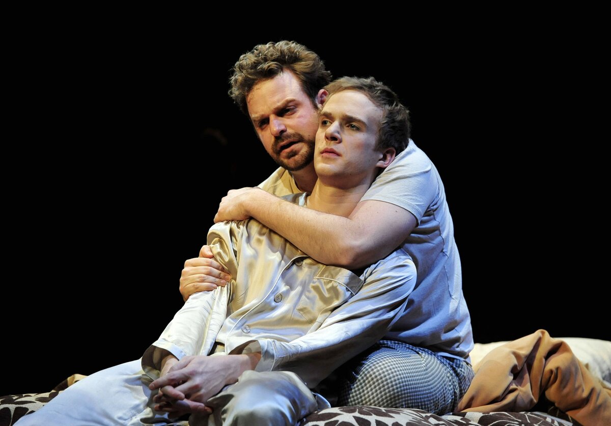 Jeffrey Meanza as Louis Ironson and Matthew Carlson as Prior Walter in Playmakers Repertory Company production of “Angels In America Part 1: Millennium Approaches.”