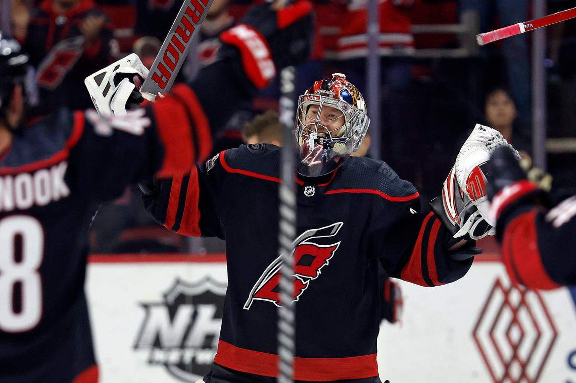 Carolina Hurricanes goaltender Antti Raanta (32) celebrates his shutout during the storm surge following an an NHL hockey game against the Ottawa Senators in Raleigh, N.C., Friday, Feb. 24, 2023.