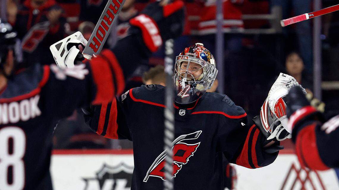 Carolina Hurricanes goaltender Antti Raanta (32) celebrates his shutout during the storm surge following an an NHL hockey game against the Ottawa Senators in Raleigh, N.C., Friday, Feb. 24, 2023.