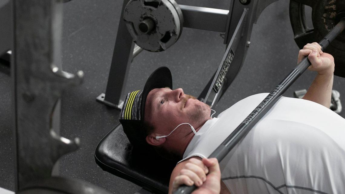 Jared Boyette lifts weights at the Bull & Bear Gym on Tuesday, May 26, 2020 in Fuquay-Varina. Boyette said it had been three months since he touched a barbell. ‘It feels good to be back doing some heavy lifting’, Boyette said after his workout.