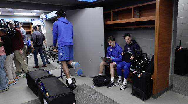 Duke’s Patrick Ngongba II wheels in the locker room before Duke’s open practice at the Bon Secours Wellness Arena in Greenville, S.C., Wednesday, March 18, 2026. The Blue Devils will face Siena Thursday in the first round of the NCAA Men’s Basketball Tournament.