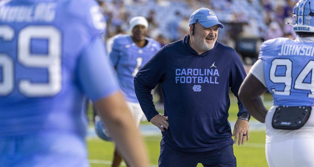 North Carolina offensive line coach Will Friend works with his unit  prior to the Tar Heels’ season opening game against Texas Christian University on Monday, September 1, 2025 in Chapel Hill, N.C.  