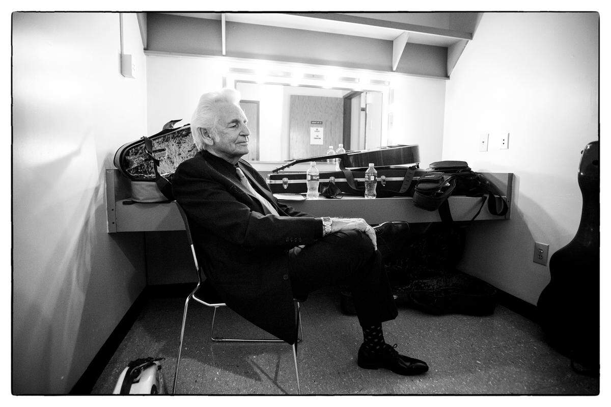Del McCoury sits in his band’s dressing room before performing at the at the 32nd Annual IBMA Bluegrass Music Awards in Raleigh, N.C., Thursday night, Sept. 30, 2021.