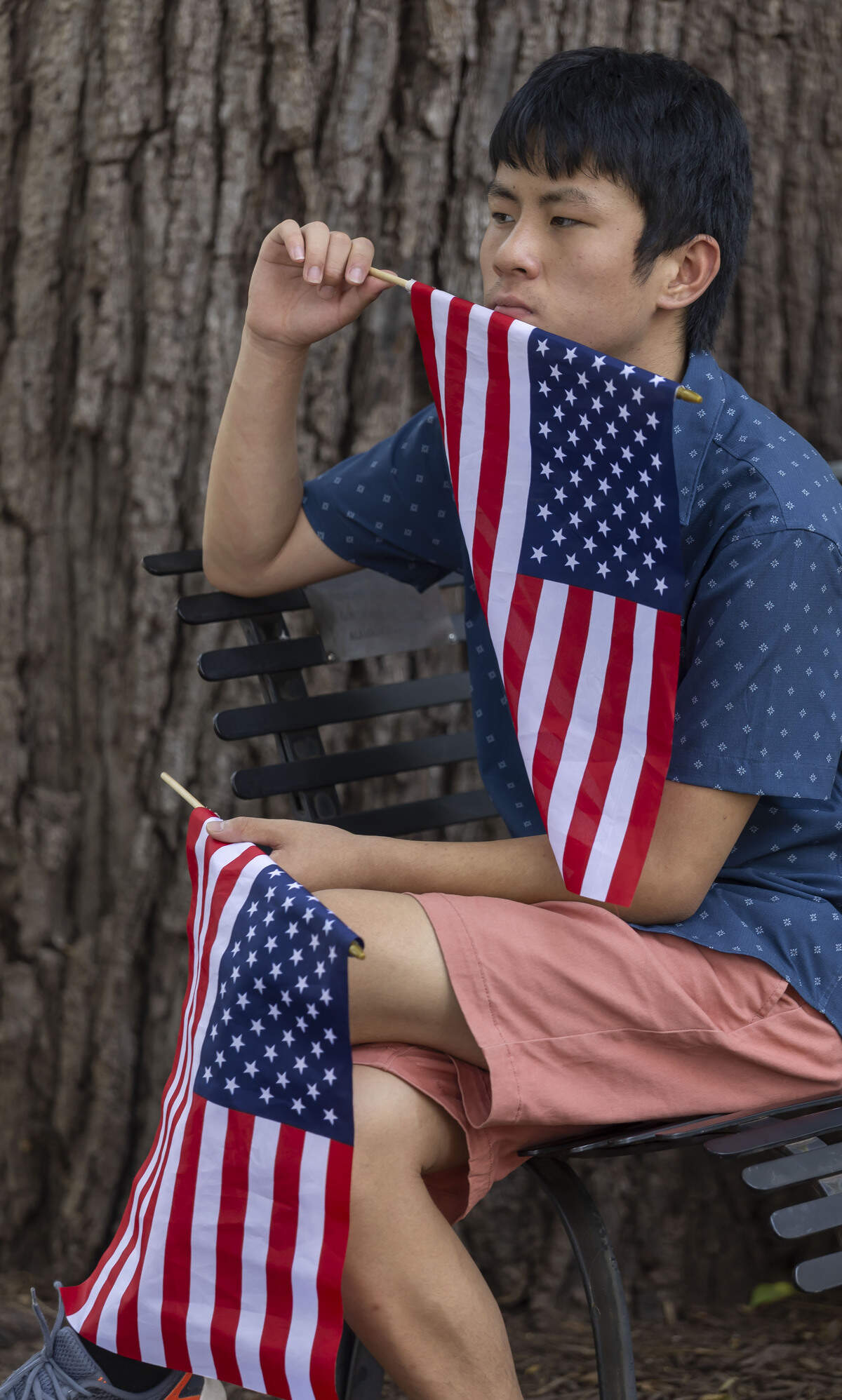 Tintin Fu of Chapel Hill, displays this patriotism with his American Flags, during the Freedom Fest 250, celebrating the country’s Semiquincentennial, on Saturday, July 4, 2026 in Raleigh, N.C.