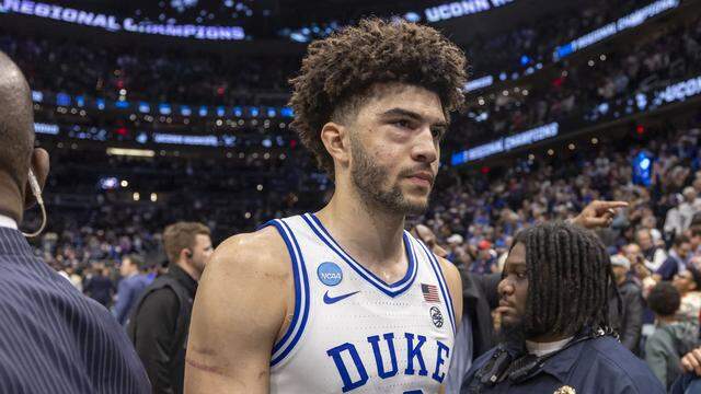 Duke forward Cameron Boozer (12) leaves the court after falling to Connecticut 73-72 on Sunday, March 29, 2026, in the NCAA East Regional Championship game at Capital One Arena in Washington, D.C.