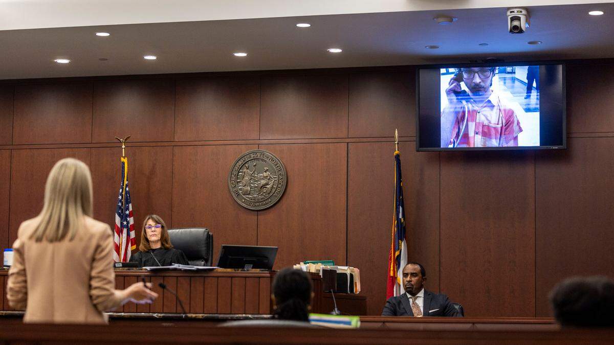 Andrew Thomas Graney makes his first appearance in court via a video feed before District Court Judge Debra Sasser at the Wake County Justice Center on Friday, Nov. 8, 2024. Graney, 23, a senior majoring in anthropology at NC State University, was charged with felony assault and discharging a firearm into an occupied vehicle or dwelling.