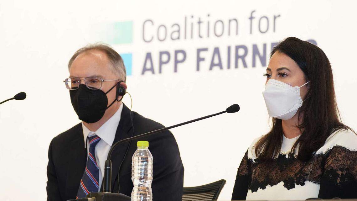 Epic Games CEO Tim Sweeney, left, attends a conference about app store fairness in South Korea.