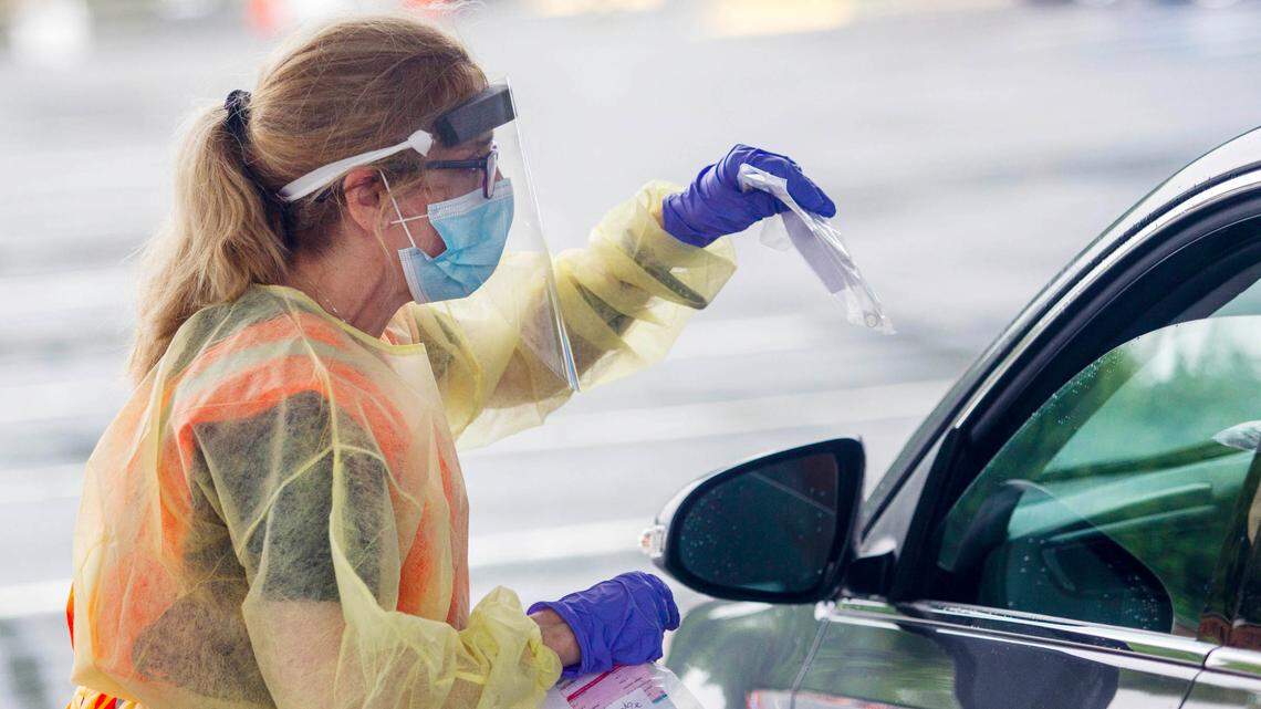 Cat Purbes, R.N., performs coronavirus tests at Hephzibah Baptist Church, in Wendell Thursday, June 11, 2020.