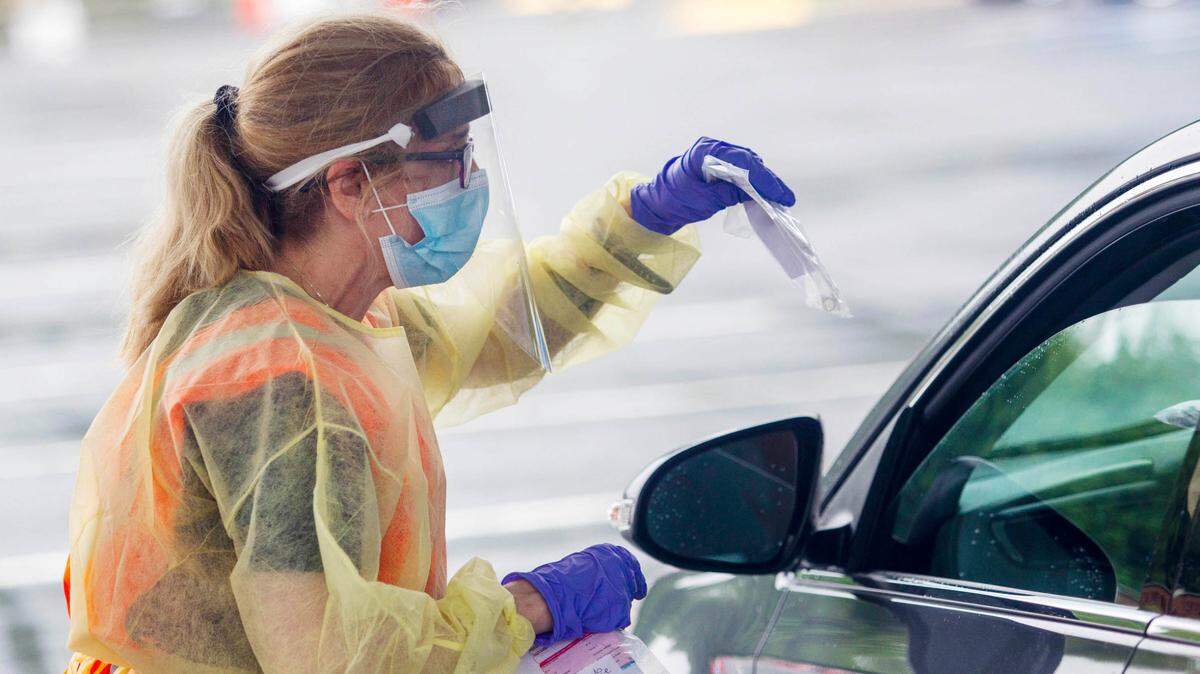 Cat Purbes, R.N., performs coronavirus tests at Hephzibah Baptist Church, in Wendell Thursday, June 11, 2020.