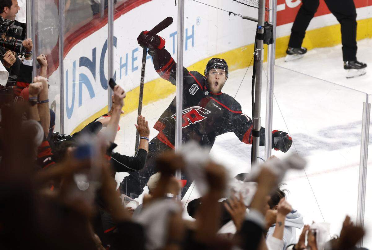 Carolina's Mark Jankowski (77) celebrates after scoring in the third period of the Hurricanes’ game against the Golden Knights in the second game of the Stanley Cup Final at the Lenovo Center in Raleigh, N.C., Thursday, June 4, 2026.
