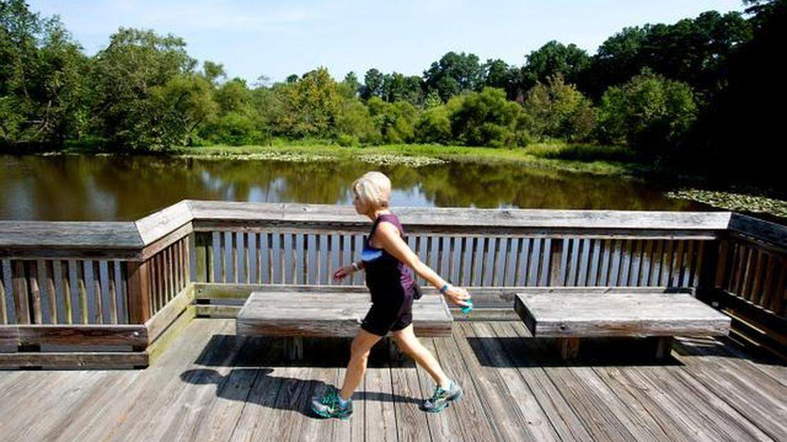June Decker of Raleigh regularly walks and jogs along the trails at Historic Yates Mill Park off Lake Wheeler Road.