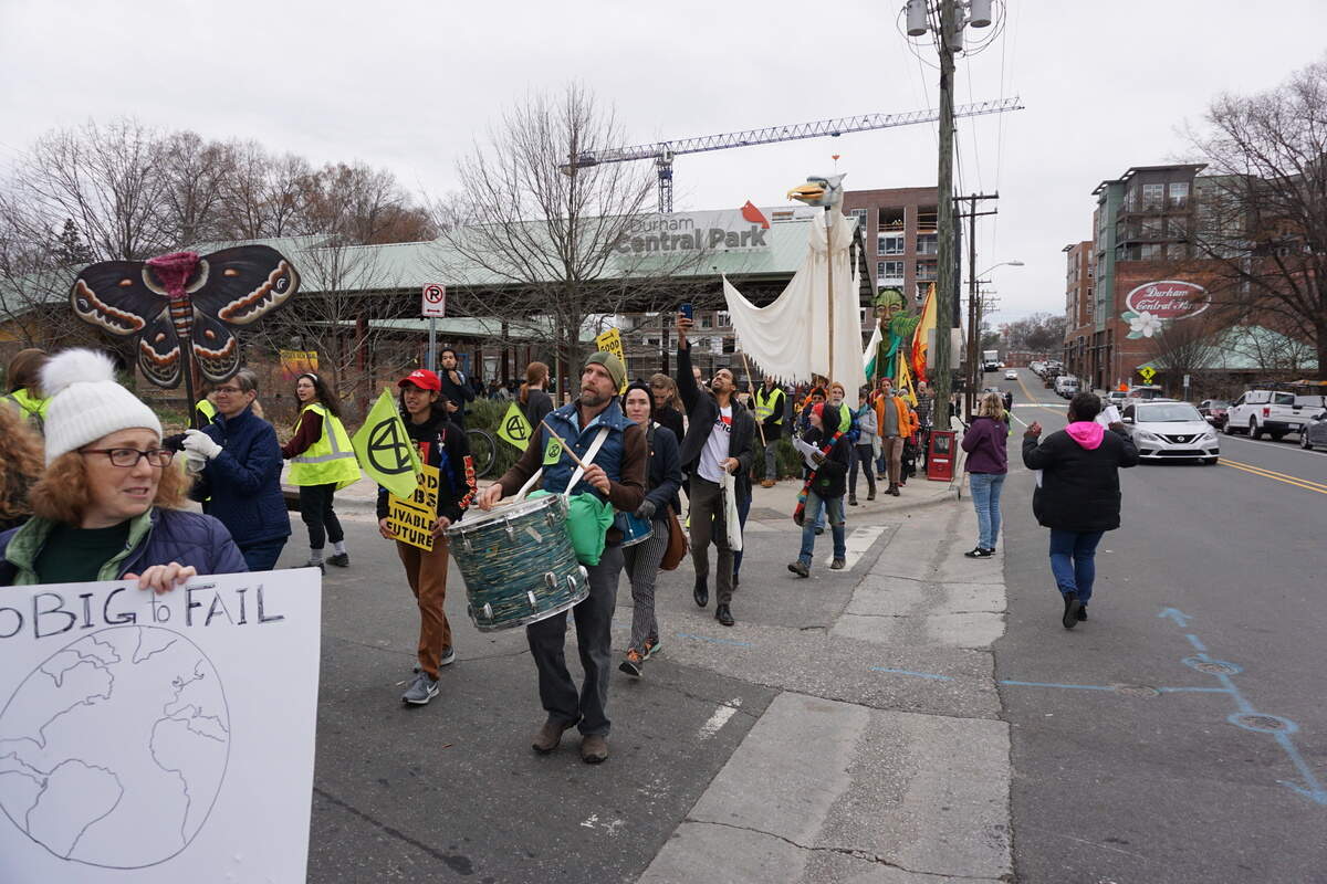 Climate protesters leaving Durham Central Park to march around downtown Durham in a climate change protest, photographed on Dec. 6, 2019.