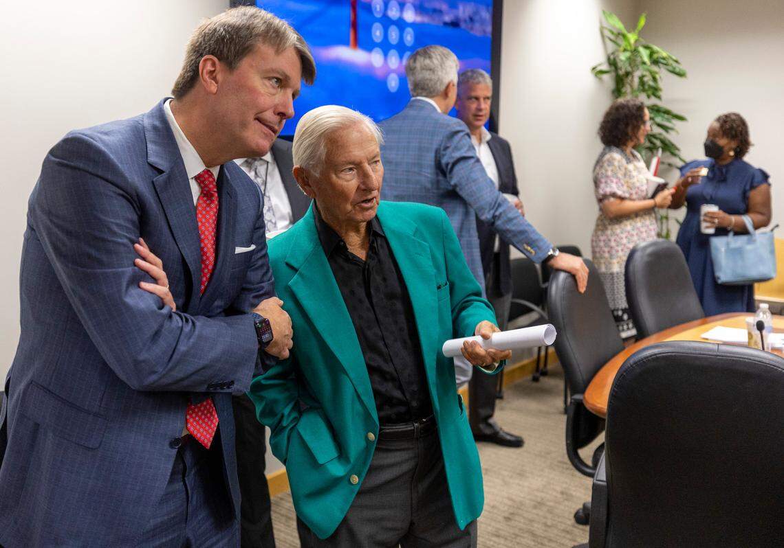 Centennial Authority Chairman Philip Isley talks with board member Wendell Murphy following their meeting on Tuesday, August 15, 2023 at PNC Arena in Raleigh, N.C. The Centennial Authority approved two agreements securing the long-term future of the Carolina Hurricanes in Raleigh, and development of the property around PNC Arena and Carter-Finley Stadium that would include housing, a hotel and a music venue.