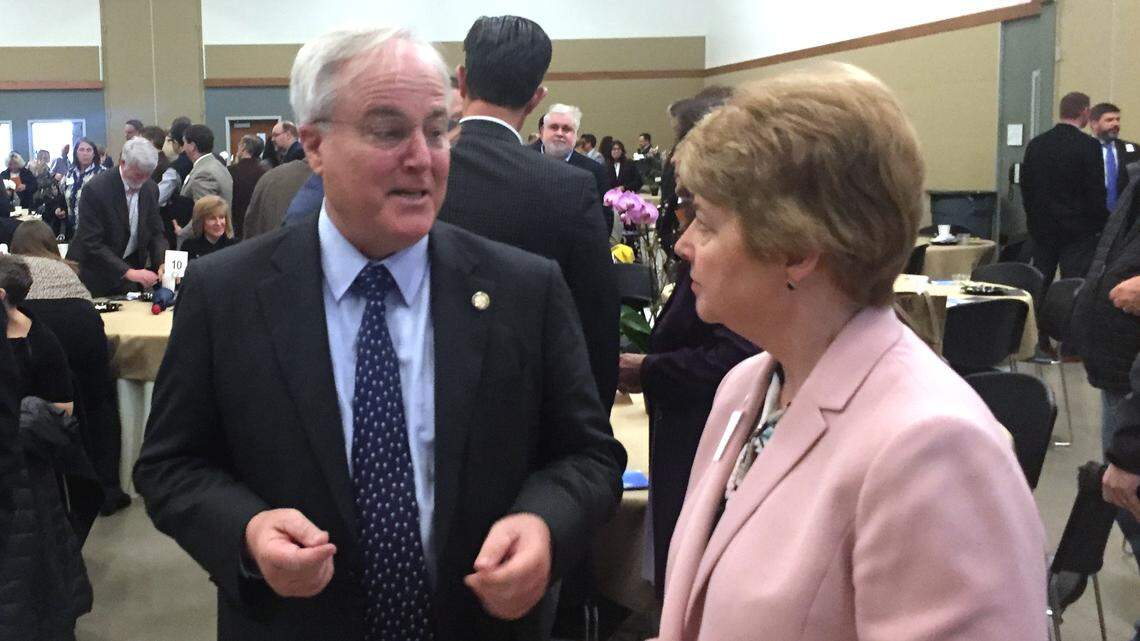 State Commerce Secretary Tony Copeland chats with incoming president of Central Carolina Community College Lisa Chapman Friday at the 10th Annual Opportunity Chatham conference in Pittsboro.