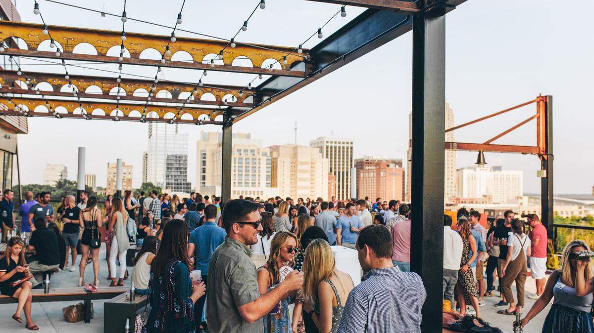An Offline after-work event held on the terrace at The Dillon building in downtown Raleigh. U.S. News listed the Raleigh metro area as one of the best places to live for young professionals.