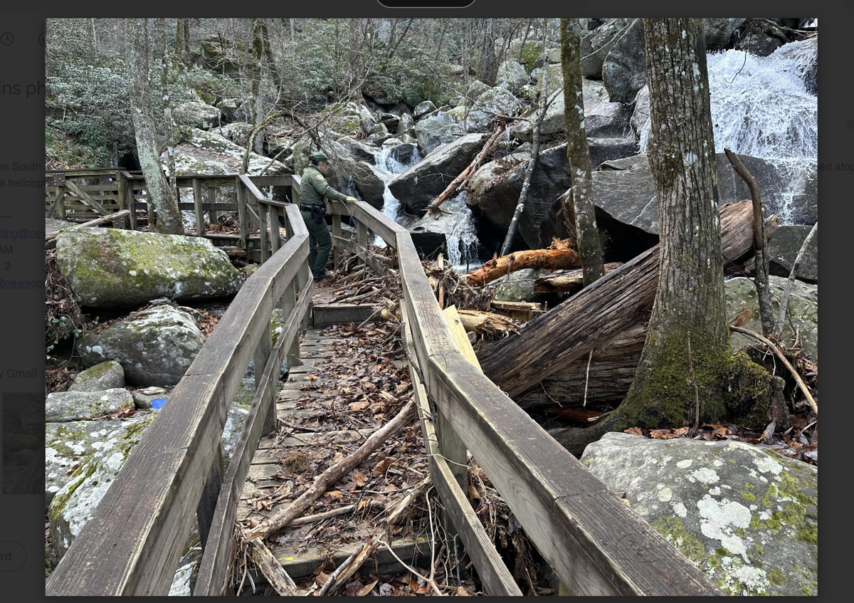 Ranger Mary Griffin pauses on the trail at the base of High Shoals Falls in South Mountains State Park on Friday, Dec. 13, 2024. The park was closed because of damage to trails after the remnants of Hurricane Helene tore through Western North Carolina.