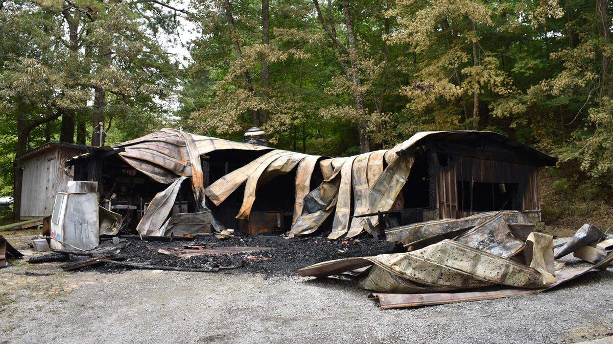 The charred remains of The Cypress Grill, which burned down late Sunday night. The fire's cause is under investigation, but its loss stung fried fish fans across the state, many of whom made at least a yearly pilgrimage.