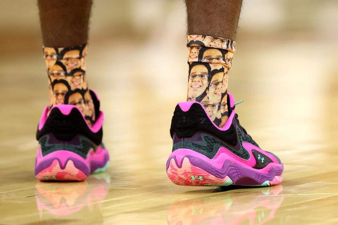 PROVIDENCE, RHODE ISLAND - MARCH 22: A detailed view of the socks of Javohn Garcia #6 of the McNeese State Cowboys with McNeese State student manager Amir "Aura" Khan is seen against the Purdue Boilermakers during the first half in the second round of the NCAA Men's Basketball Tournament at Amica Mutual Pavillion on March 22, 2025 in Providence, Rhode Island. (Photo by Maddie Meyer/Getty Images)