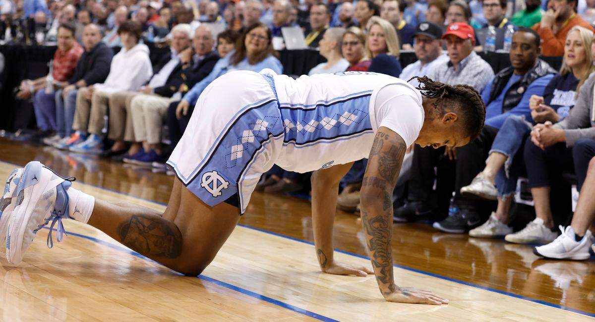 North Carolina’s Armando Bacot (5) gets himself up after he was injured during the first half of UNC’s game against Boston College in the second round of the New York Life ACC Men’s Basketball Tournament in Greensboro, N.C., Wednesday, March 8, 2023.