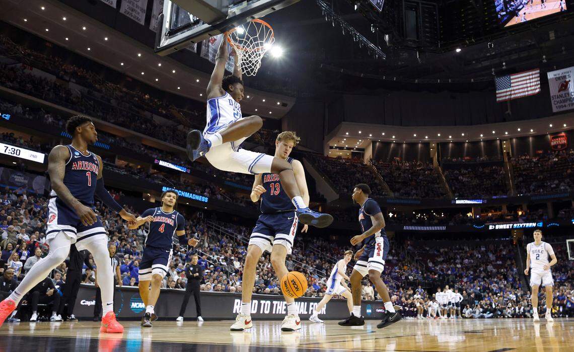 Duke’s Patrick Ngongba II (21) slams in two during Duke’s 100-93 victory over Arizona in the Sweet 16 round of the 2025 Men’s NCAA Basketball Championship at the Prudential Center in Newark, N.J., Thursday, March 27, 2025.