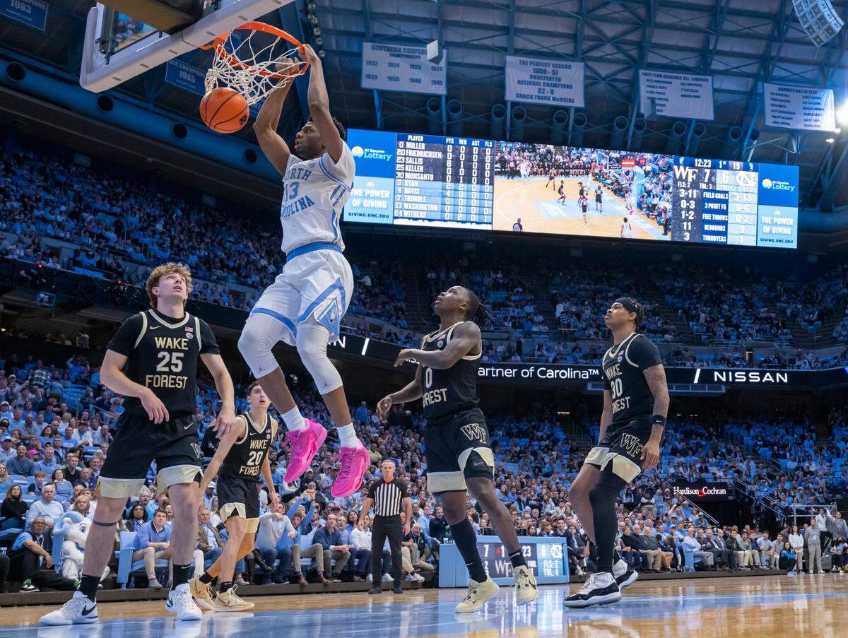 North Carolina’s Jalen Washington (13) gets a dunk in the first half against Wake Forest on Monday, January 22, 2024 at the Smith Center in Chapel Hill, N.C.