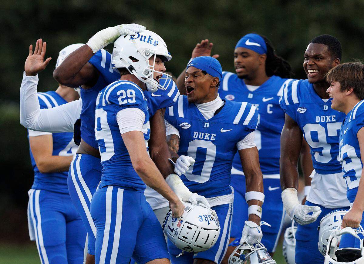 Duke’s Todd Pelino (29) is congratulated by teammates after making a field goal to give the Blue Devils a 10-0 lead over UConn during the first half on Saturday, Sept. 14, 2024, at Wallace Wade Stadium in Durham, N.C.