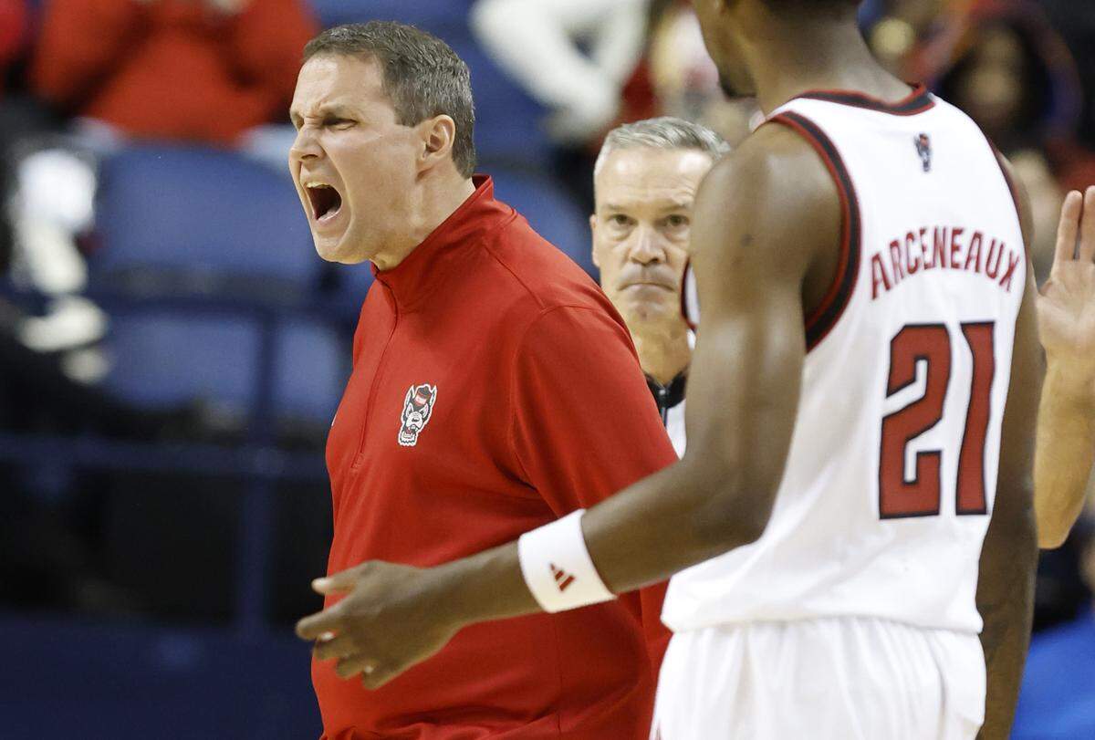N.C. State head coach Will Wade yells while calling a timeout in the first half of  N.C. State’s exhibition game against South Carolina at the First Horizon Coliseum in Greensboro, N.C., Sunday Oct. 26, 2025.