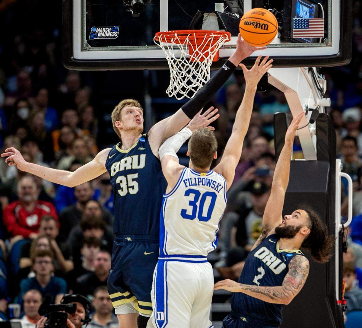 Oral Roberts’ Connor Vanover (35) blocks a shot by Duke’s Kyle Filipowski (30) in the first half during the first round of the NCAA Tournament on Thursday, March 16, 2023 at the Amway Center in Orlando, Fla.