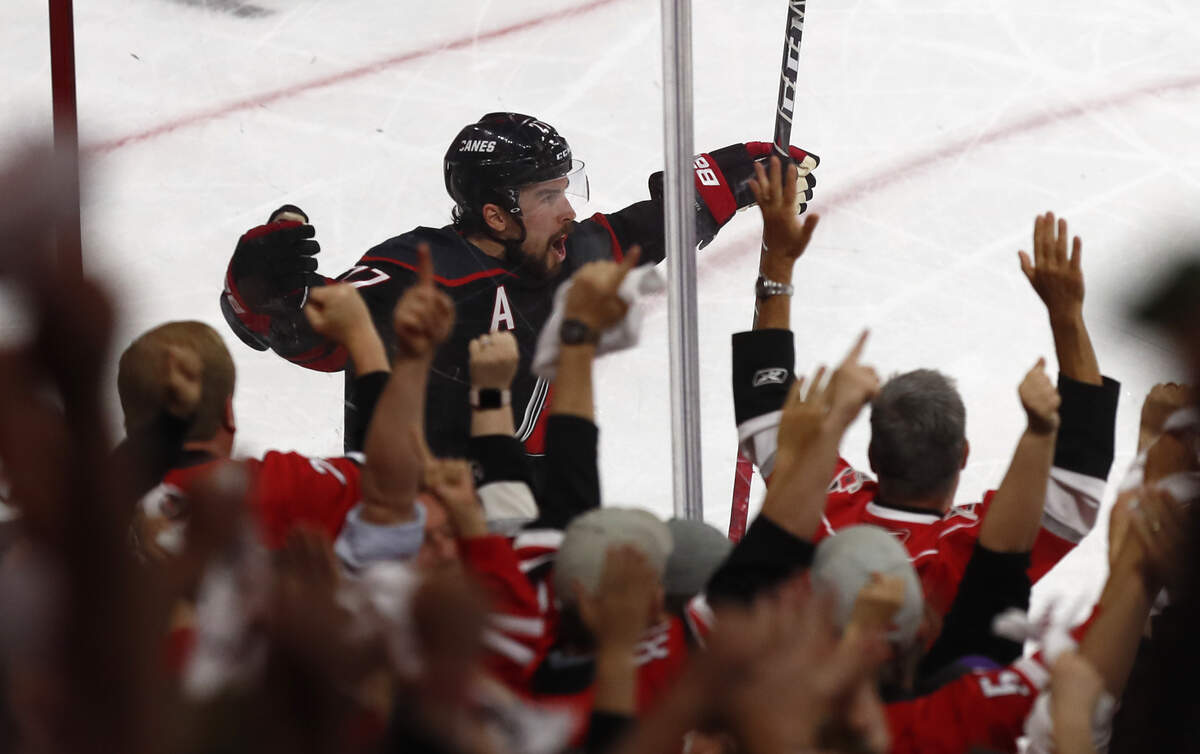 Carolina’s Justin Faulk (27) celebrates after scoring during the second period of the Carolina Hurricanes’ game against the New York Islanders at PNC Arena in Raleigh Wednesday, May 1, 2019.
