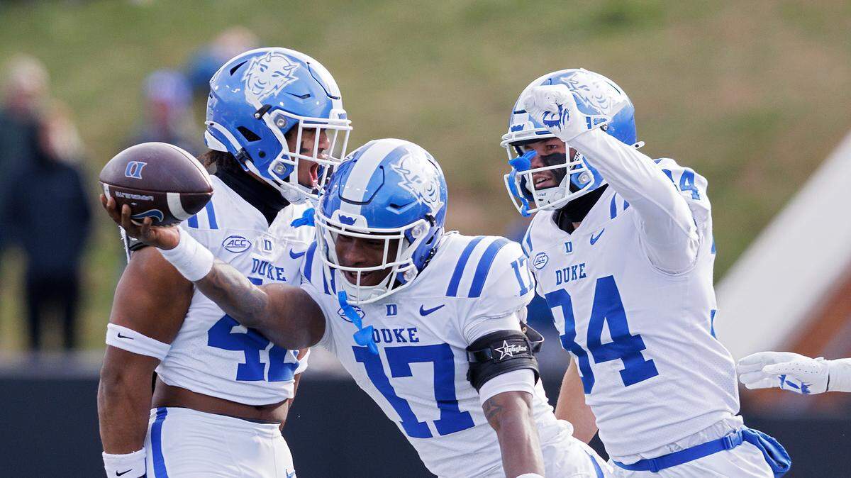 Duke’s Vontae Floyd, center, reacts after recovering a Wake Forest fumble during the second half of the Blue Devils’ 23-17 win at Allegacy Stadium on Saturday, Nov. 30, 2024, in Winston-Salem, N.C.